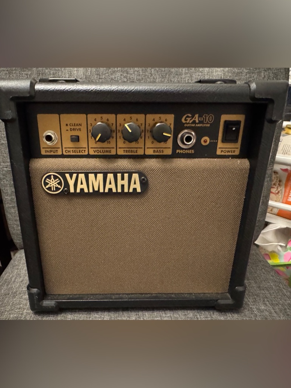 Yamaha Guitar Amplifier with Black Exterior and Silver Speaker